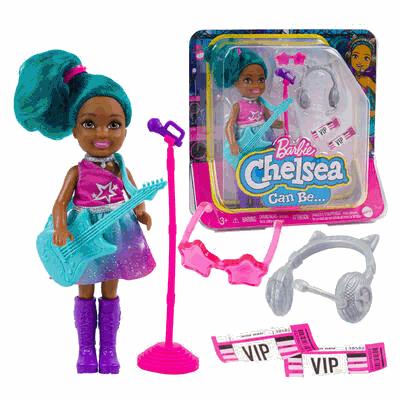Barbie Chelsea doll with guitar, microphone, and accessories on a white background