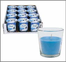 Blue candles in a glass holder with a box of candles in the background