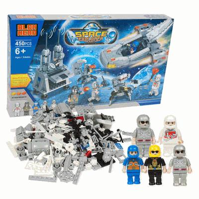 Toy building block set with figures and space-themed packaging on a white background