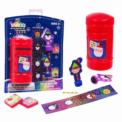 Christmas-themed letter writing kit with red mailbox, Santa stamp, and other accessories on a white background.