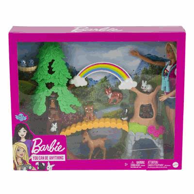 Barbie nature playset packaging with trees, animals, and rainbow.
