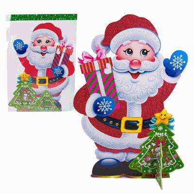 Colorful Christmas-themed cutout of Santa Claus with a stocking and presents, next to a smaller version of the same design.