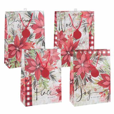 Set of four Christmas-themed gift bags with floral designs and text on a white background.