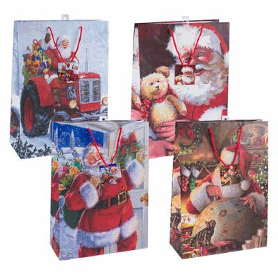 Set of Christmas-themed gift bags with Santa Claus and festive designs.
