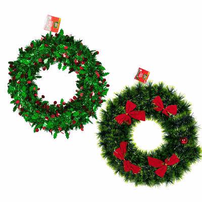 Two Christmas wreaths with red bows on a white background