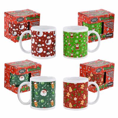 Set of Christmas-themed mugs with matching boxes on a white background