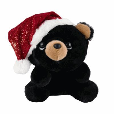 Black bear plush toy wearing a red Santa hat on a white background