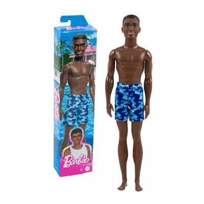 Barbie doll with blue camouflage swim trunks next to its packaging
