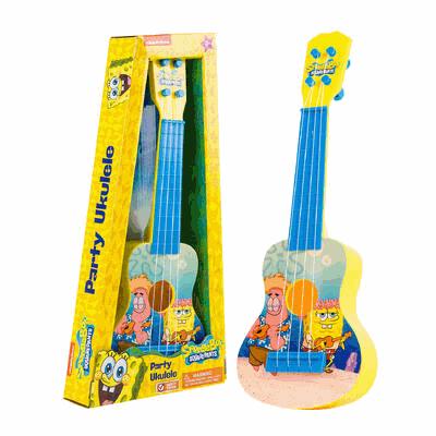 Toy ukulele with SpongeBob SquarePants design next to its packaging on a white background