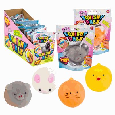 Squishy toys with packaging and a display box on a white background
