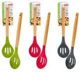 Set of four colorful kitchen utensils with wooden handles on packaging
