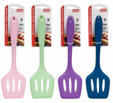 Set of four slotted turners in different colors with packaging in the background.