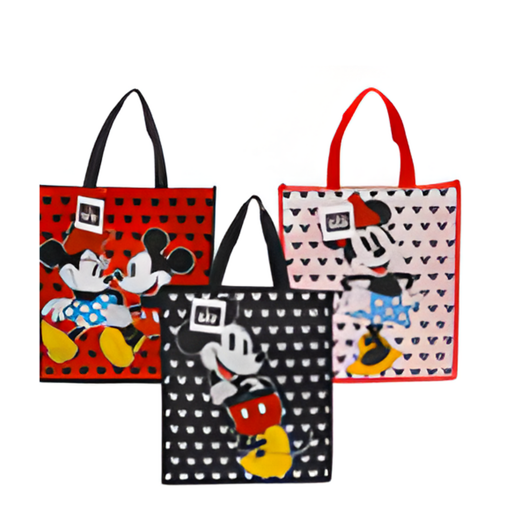 Three tote bags featuring cartoon characters on a white background