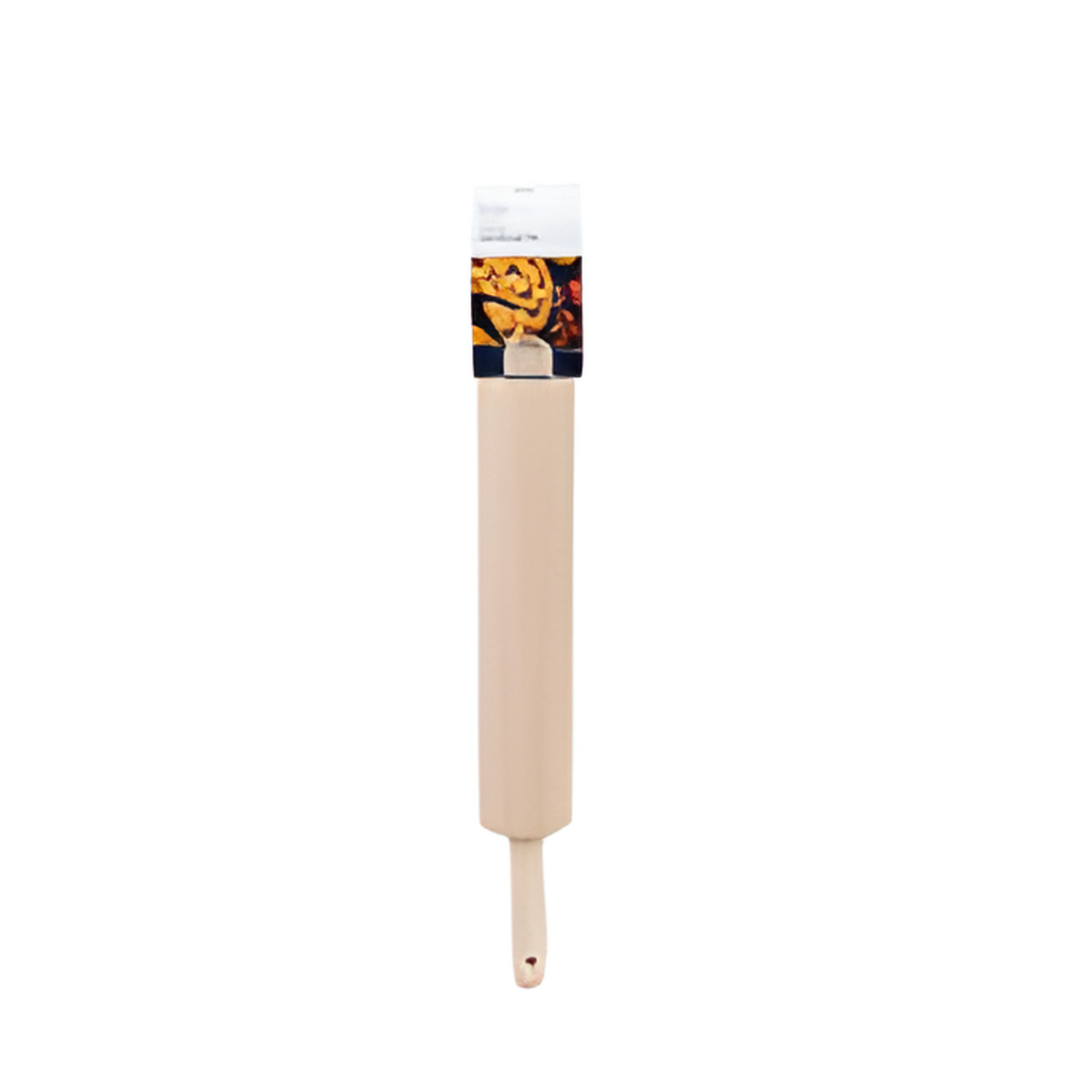 Beige rolling pin with a black and orange label on a white background