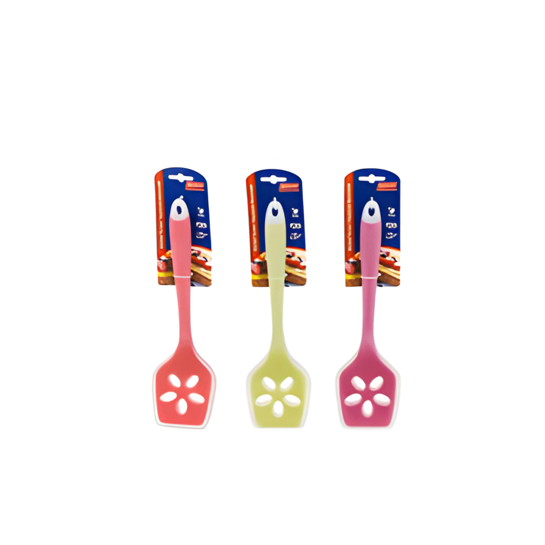 Three colorful spatulas with floral ends on a white background